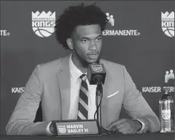  ?? MIKE BUSH/NEWS-SENTINEL ?? Sacramento Kings forward Marvin Bagley III talks to the press at an introducto­ry press conference at the Golden 1 Center on June 23.