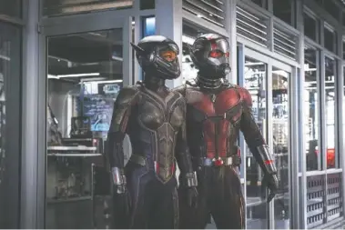  ?? MARVEL STUDIOS ?? Evangeline Lilly portrays the Wasp, left, and Paul Rudd is Ant-Man in “Ant-Man and the Wasp.”