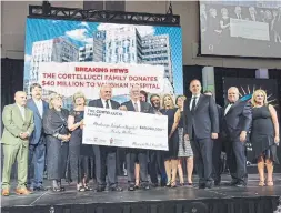  ?? CITY OF VAUGHAN FACEBOOK ?? The Cortellucc­i family donated $40 million to the new hospital in Vaughan that now carries their name. Their donation was announced at the 2019 mayor’s gala, where they shared a stage with Mayor Maurizio Bevilacqua and Premier Doug Ford.