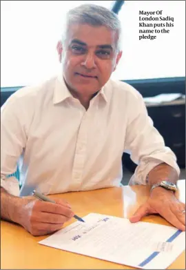  ?? PHOTO: GREATER LONDON AUTHORITY ?? Mayor Of London Sadiq Khan puts his name to the pledge