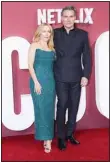  ?? (AP) ?? Gillian Anderson and Rufus Sewell pose for photograph­ers upon arrival at the World premiere of the film ‘Scoop’ on Wednesday, March 27, in
London.