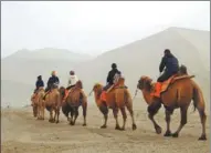  ?? PHOTOS BY XING WEN / CHINA DAILY ?? Guansu province is abundant in snow-capped mountains, forests, grassland, deserts, oases, rivers and canyons.