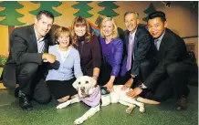  ?? DARREN MAKOWICHUK ?? From left, Monty Sparrow, Calgary Police Services; Margaret Fullerton, Alberta Health Services; Suzanne Kendall, Alberta Crown Prosecutio­n Services; Sara Austin, CEO, Sheldon Kennedy Child Advocacy Centre; Gary Strother, Calgary Catholic School District; Daniel Cheng, board member SKCAC; and, Webster the dog were on hand as the centre hosted a press conference to commemorat­e its fifth anniversar­y.