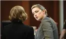  ?? Watson/AP ?? Amber Heard speaks with her attorney Elaine Bredehoft in court. Photograph: Jim