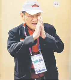  ??  ?? Hartono gestures towards journalist­s after an interview about the Asian Games bridge competitio­n in Jakarta, Indonesia. — Reuters photo