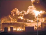 ?? AP ?? Smoke and flames rise from a Saudi Aramco oil facility in Saudi Arabia’s Red Sea coastal city of Jeddah on Friday following a reported Yemeni rebels attack.