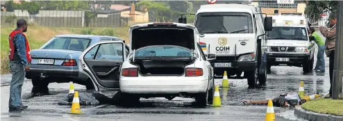  ?? Picture: Shelley Christians ?? The aftermath of a cash-in-transit heist in Cape Town. Security companies say the dramatic increase in such attacks this year has reached crisis level.