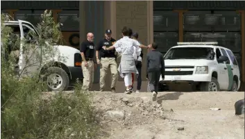  ?? MARK LAMBIE — THE EL PASO TIMES VIA AP ?? In this file photo, a group of asylum seekers cross the border between El Paso, Texas, and Juarez, Chihuahua, Mexico, Thursday.