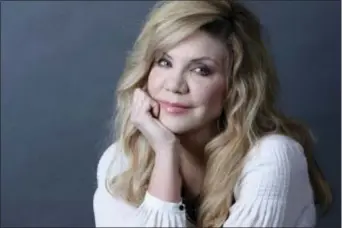  ?? PHOTO BY AMY SUSSMAN — INVISION — AP ?? In this photo, Grammy Award-winning artist Alison Krauss poses for a portrait in New York to promote her solo album, “Windy City.”