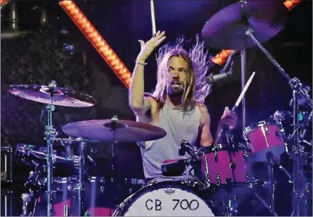  ?? AFP ?? Foo Fighters’ drummer Taylor Hawkins on stage at the Lollapaloo­za 2022 music festival in Santiago on March 1.