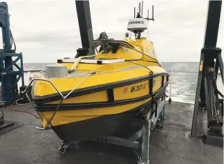  ?? ?? This C-worker is a 14-foot diesel-powered, shallow-water uncrewed surface vehicle equipped with NOAA mapping equipment.