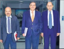  ?? ANIRUDDHA CHOWDHURY/MINT ?? RBI goveror Urjit Patel (centre) flanked by deputy governors N S Vishwanath­an (left) and Viral Acharya.