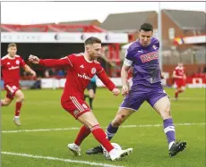  ??  ?? BEFORE THE STORM: Accrington’s Jordan Clark puts a cross into the Rotherham penalty area