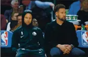  ?? DOUG DURAN — BAY AREA NEWS GROUP, FILE ?? The Warriors’ Stephen Curry, left, and Klay Thompson watch the team play the Rockets in the third quarter at Chase Center in San Francisco on Feb. 20.