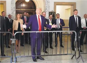  ?? MARY ALTAFFER AP ?? Former President Donald Trump speaks to reporters as he leaves the courtroom Wednesday in New York.