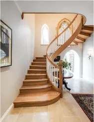  ?? ?? STAIRCASE
The vicarage originally had two staircases – the main stairs, which were replaced with this new sweeping design, and the back stairs that led directly to the kitchen from the servants’ quarters.
For a similar staircase, try Kevala Stairs. Wychwood limestone weathered finish floor tiles, £48sq m, Artisans of Devizes. Kingston round dark wood dining table, £169.99, Furniture and Choice, is similar