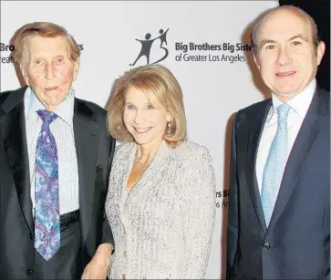  ?? Frederick M. Brown Getty I mages ?? SUMMER REDSTONE, left, daughter Shari and Philippe Dauman at a 2012 fundraiser. The Viacom board voted 10 to 1 to name Dauman, 61, as chairman of the company. Shari Redstone cast the lone “no” vote.