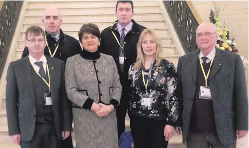  ??  ?? DUP leader Arlene Foster and victims’ campaigner­s at Stormont yesterday