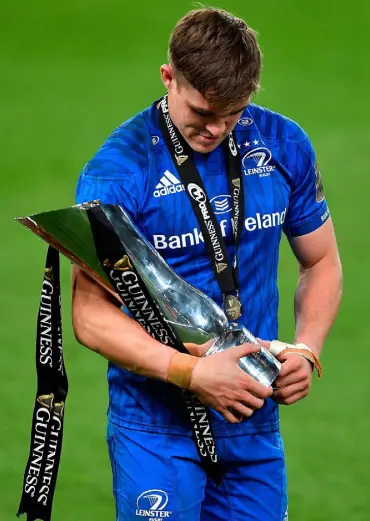  ??  ?? Garry Ringrose of Leinster cradles the trophy after the Guinness PRO14 final match between Leinster and Ulster last September — sponsorshi­p plays a huge part in profession­al sport