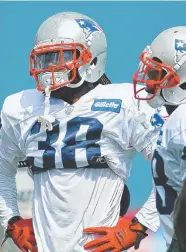  ?? STAFF PHOTO BY JOHN WILCOX ?? RECEIVING BIG OPPORTUNIT­Y: Brandon Bolden could be in line for a spot as the third-down back for the Patriots.