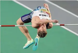  ?? | PHOTO : REUTERS ?? Kevin Mayer n’a pas fait mieux qu’1,98 m à la hauteur, hier.