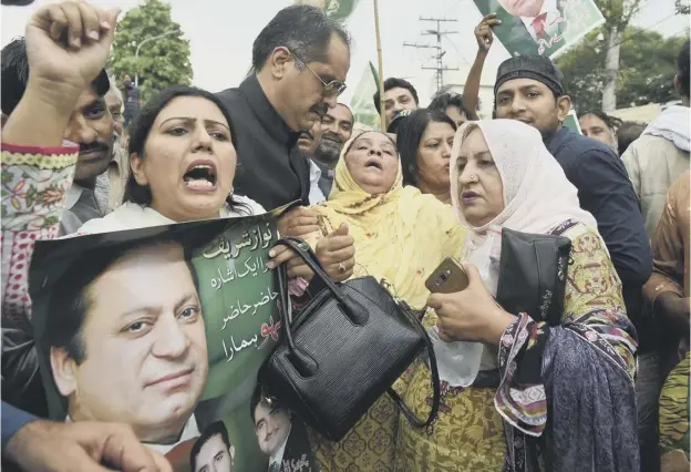  ?? PICTURE: ARIF ALI/AFP/GETTY IMAGES ?? Activists of the Pakistan Muslim League Nawaz protest in Lahore over the Supreme Court’s decision on prime minister Nawaz Sharif
