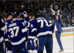  ?? Phelan Ebenhack / Associated Press ?? Tampa Bay Lightning head coach Jon Cooper said the Stanley Cup finals felt like “the last day of school.”