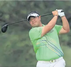  ?? AFP ?? Kiradech Aphibarnra­t plays a shot at the Memorial Tournament.