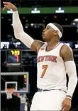  ?? Elsa/Getty Images ?? It was quiet enough in Madison Square Garden Sunday that you could have heard Carmelo Anthony call “Swish!”