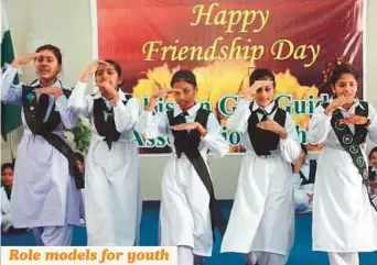  ?? Online ?? Girls performing during Happy Friends Day at Girls Guide House in Islamabad yesterday. The guides play a major role in empowering young women in Pakistan.