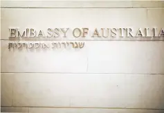  ??  ?? A Hebrew and English sign is seen at the entrance to the Australian Embassy in Tel Aviv, Israel.— Reuters photo