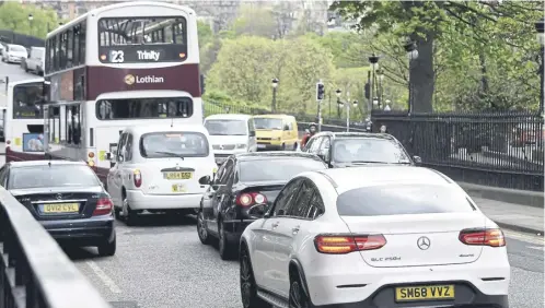  ?? PICTURE: LISA FERGUSON/SCOTSMAN ?? Road users in Scotland could be charged to use certain routes in a bid to encourage more use of public transport