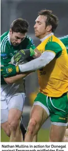  ??  ?? Nathan Mullins in action for Donegal against Fermanagh midfielder Eoin Donnelly in the Dr McKenna Cup