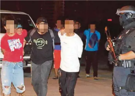  ??  ?? Three suspects being led away by police in Kuala Lumpur on Sept 14.