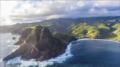  ?? Courtesy of Kawena Alo-Kaonohi via AP ?? A view looking down into Kahakuloa village is shown here on Jan. 18, 2020. Two Native Hawaiian men were sentenced to prison Thursday for a federal hate crime in the 2014 brutal beating of a white man who tried to move into Kahakuloa.