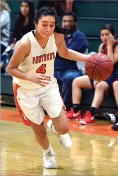  ?? RECORDER PHOTO BY CHIEKO HARA ?? Portervill­e High School’s Jazlynne Medrano drives to the basket during a game earlier this season. The team host Santa Clara High School at Bill Sharman Gymnasium at 7 p.m. for a CIF State Division V playoff game..