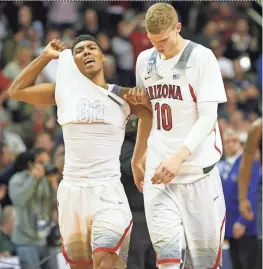  ?? MICHAEL CHOW/AZCENTRAL SPORTS ?? Arizona guard Allonzo Trier (left) and forward Lauri Markkanen react after losing to Xavier in the NCAA West Regional at SAP Center in San Jose on Thursday night.