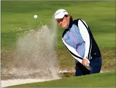  ??  ?? Team GB captain Catriona Matthew plays from a bunker