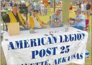  ?? Westside Eagle Observer/SUSAN HOLLAND ?? Members of the John E. Tracy American Legion Post at Gravette set up a tent and visited with Gravette Day guests Saturday in Kindley Park. Pictured are Legion members Mark Russow, Darrell Mercer, Jim Brooks and Mike Carnahan.