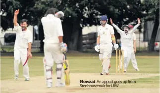  ??  ?? Howzat An appeal goes up from Stenhousem­uir for LBW