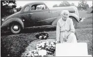 ?? Photo from www.findagrave.com ?? Ed Bolain’s great-grandmothe­r, Cordelia “Ann” Bolain, at her husband Zack Bolain’s grave at Pea Ridge Cemetery in 1944.