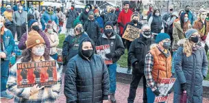  ?? KEREM YUCEL AFP VIA GETTY IMAGES ?? A crowd protests the Rittenhous­e verdict outside a police precinct in Minneapoli­s on Saturday.