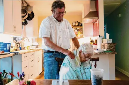  ?? Photos by Desiree Rios/New York Times ?? Frank Lee manages the schedules of three home care employees who have assisted his wife, Robin, since her Alzheimer’s diagnoses.