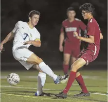  ?? STaff phoTos by MaTT sToNE ?? SKY’S THE LIMIT: After building around defense a year ago, Tiago Gomes (left), Sam Chung (above) and Arlington have been an offensive powerhouse early.