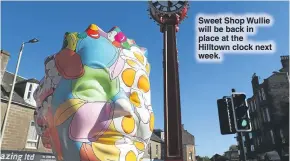  ??  ?? Sweet Shop Wullie will be back in place at the Hilltown clock next week.