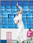  ??  ?? India cricketer Umesh Yadav bowls during day four of the 1st Test cricket match between West Indies and India on July 24, at the Sir Vivian Richards Stadium in St John’s, Antigua. (AFP)