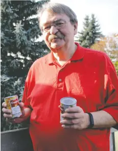  ?? [WHITNEY NEILSON / THE OBSERVER] ?? Fred Karpala is encouragin­g Woolwich residents to place food bank donations outside by 9 a.m. on Saturday morning for the Elmira Kiwanis Club’s annual Woolwich Christmas Goodwill Door-to-Door Food Drive.