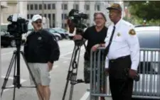  ?? ROBERT COHEN/ST. LOUIS POST-DISPATCH VIA AP ?? St. Louis Sheriff Vernon Betts talks to members of the local media as they await the arrival of Missouri Gov. Eric Greitens outside the Civil Courts building on the second day of jury selection in the governor’s felony invasion of privacy trial on...