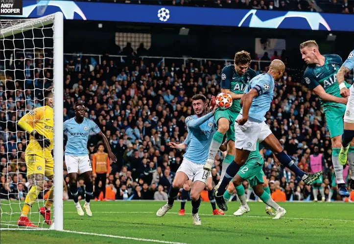  ?? PICTURE: ANDY HOOPER ?? Stroke of luck: Llorente leaps and misses his header but the ball hits hip and arm to go past Ederson for the decisive goal that scuppered City and booked Tottenham