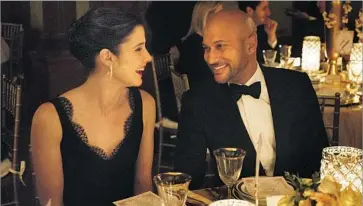  ?? Barbara Nitke Netf lix ?? LISA (Cobie Smulders) and Ethan (Keegan-Michael Key) share a light moment in “Friends From College.”